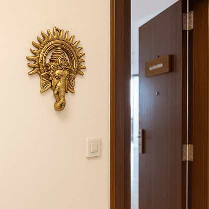 Golden Lord Ganesha Face With Sun Decorative Metal Wall Hanging ( 10 Inch )