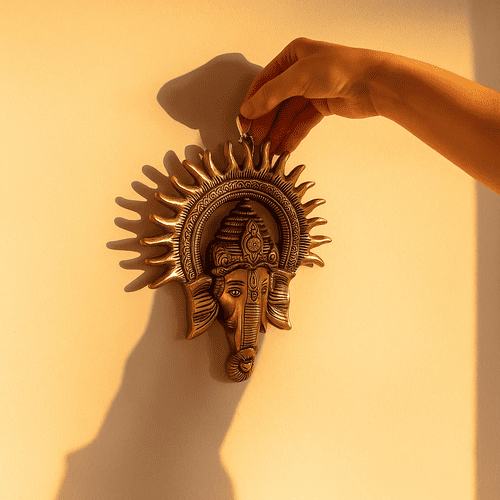 Golden Lord Ganesha Face With Sun Decorative Metal Wall Hanging ( 10 Inch )